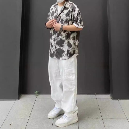 Loose Fitting Casual Straight Leg Cargo Pants With Multiple Pockets And A Drawstring Waist
